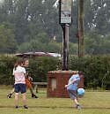 Football in the rain at Brundish village fete