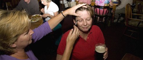 Helen Bolingbroke making up Kettleburgh Chequers landlady Debbie Germaine